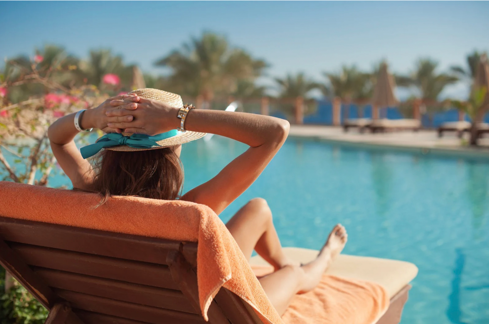 woman by pool.png__PID:3350e5e1-7d75-4d75-83ca-43a9642f13d8
